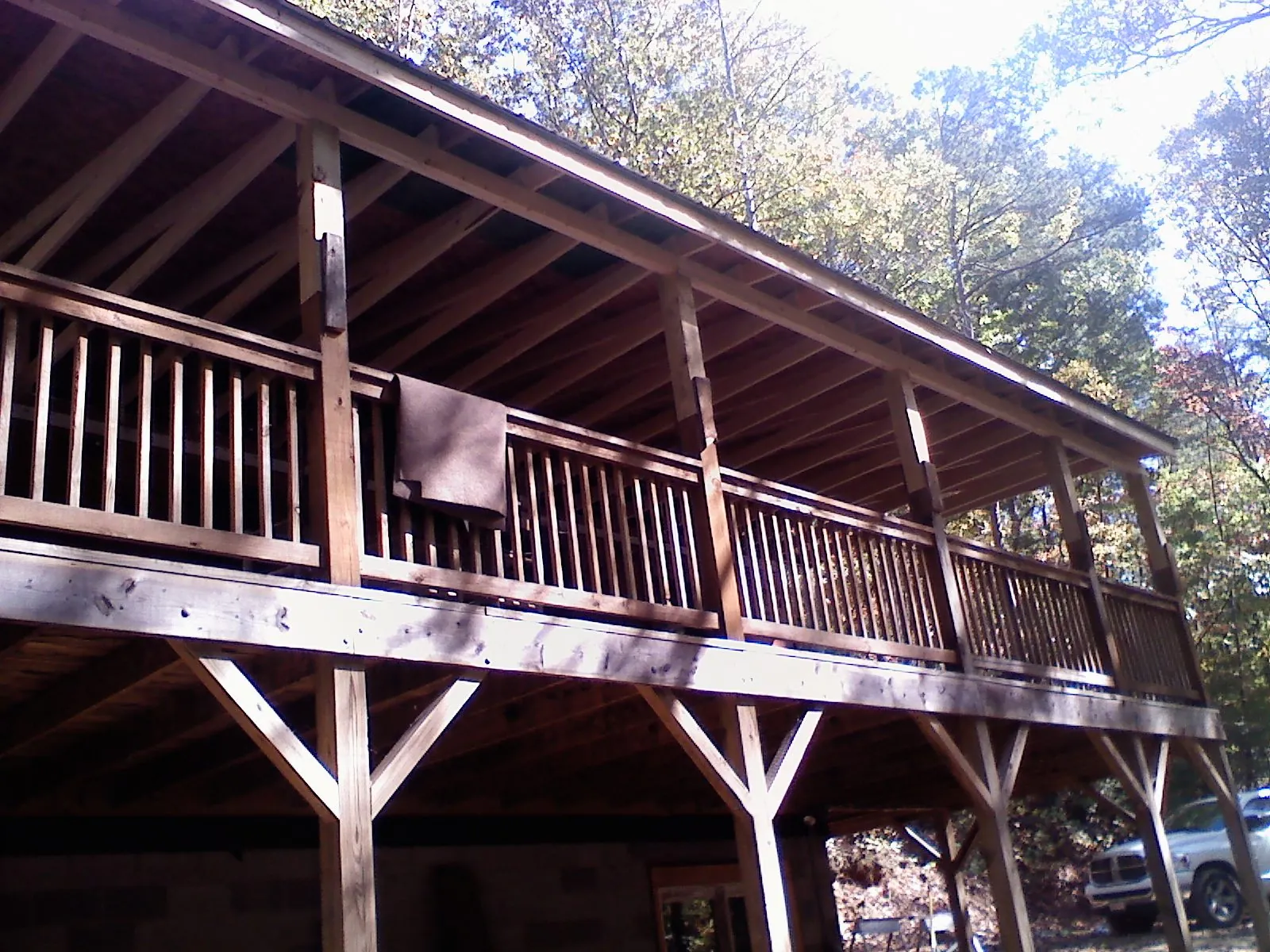 Timber framing under a new elevated porch and deck — Roof Leak Repair in Reseda by Roofing Brothers